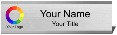 Silver engraved 2x8 name plate seated in a desk holder
